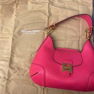 Michael kors handbag in a hot pink color